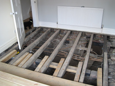 Living Room La Vida Loca Part Dos:  Replacing & Refinishing the Floorboards