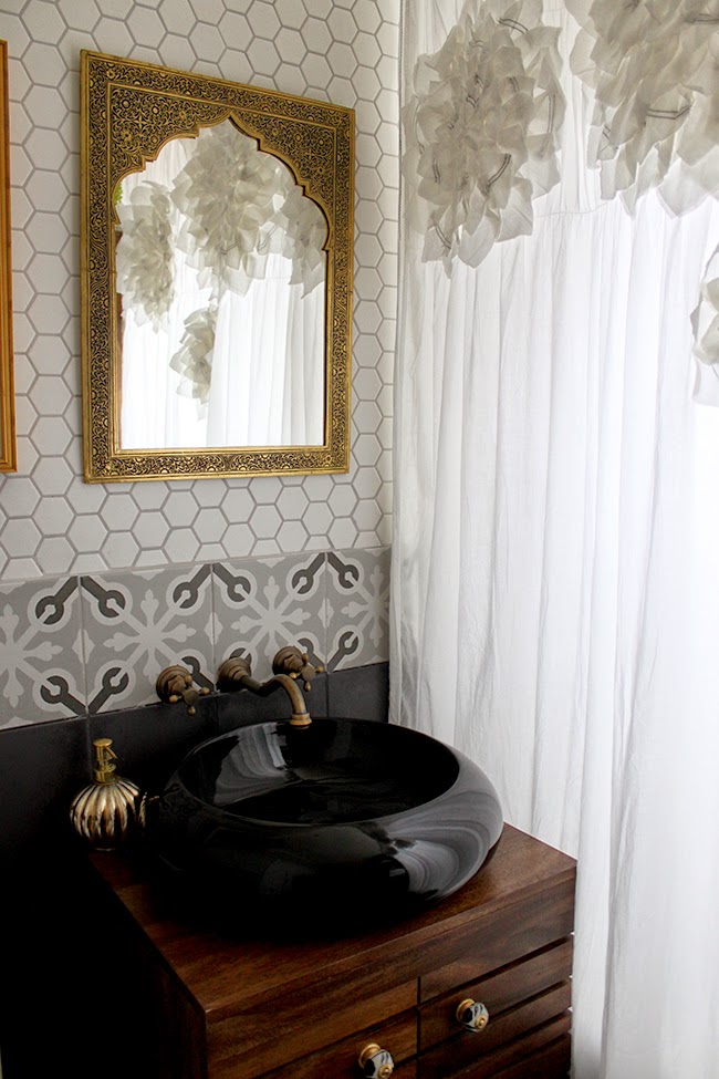 We're FINALLY revealing our eclectic boho glam bathroom remodel