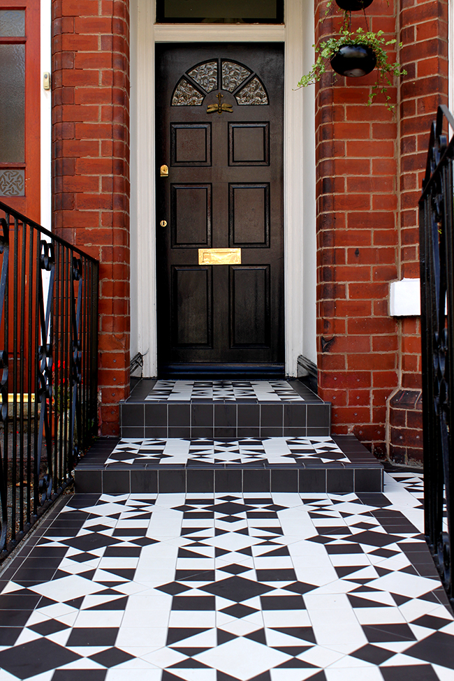 Edwardian house with victorian black and white style tiles