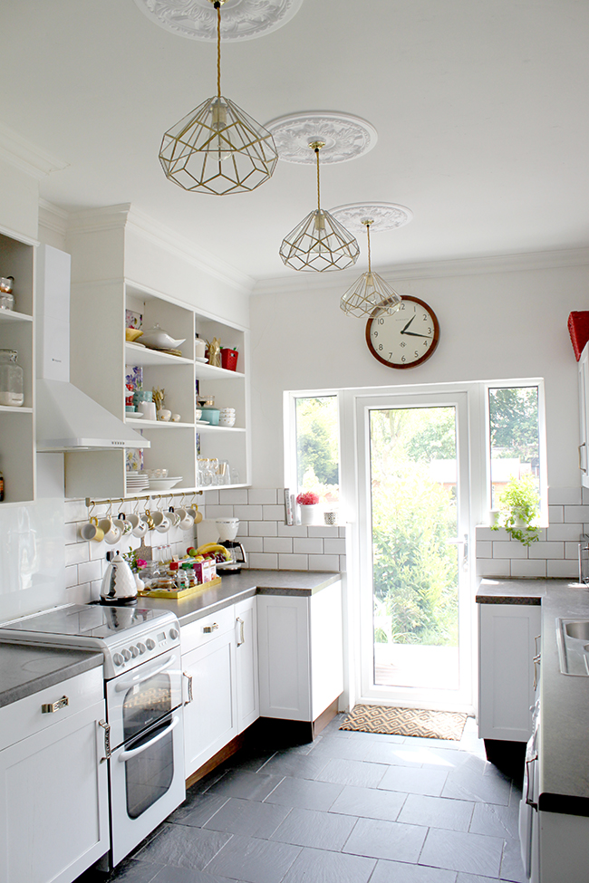 DIY Brass and Glass Kitchen Pendants - Swoon Worthy