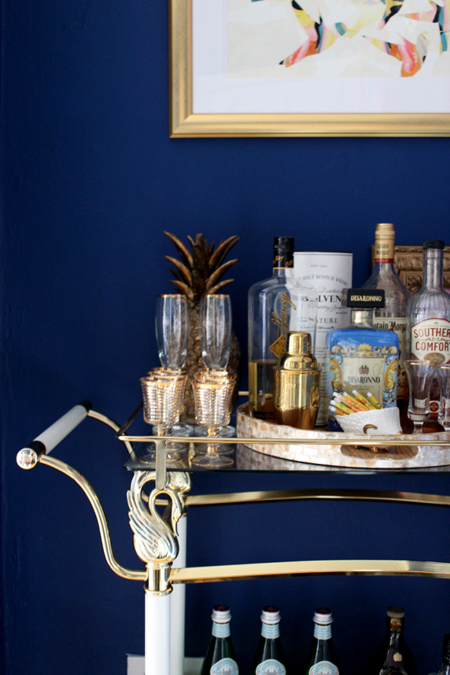 Updating the bar cart in my dining room with a new tray from HomeSense