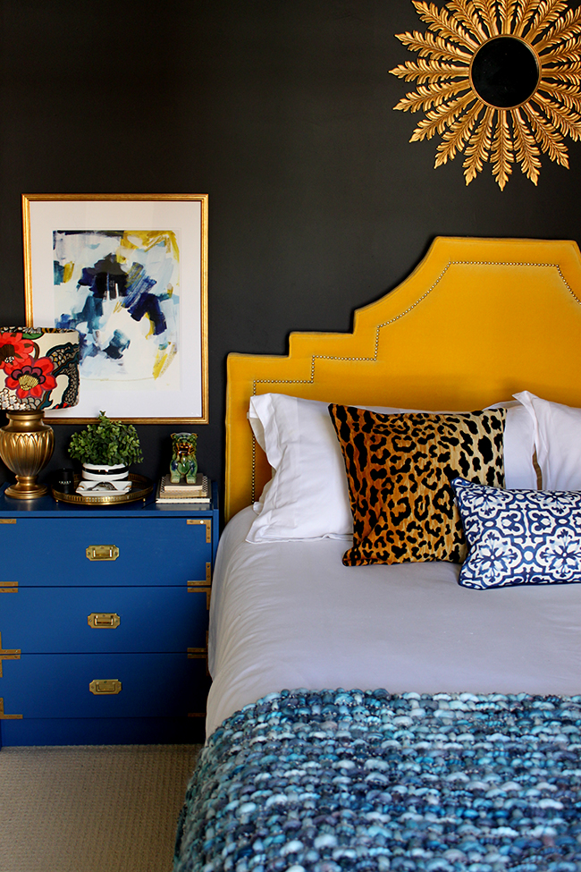 Swoon Worthy bedroom - blue ikea rast hack, minted art, yellow headboard, leopard print cushion