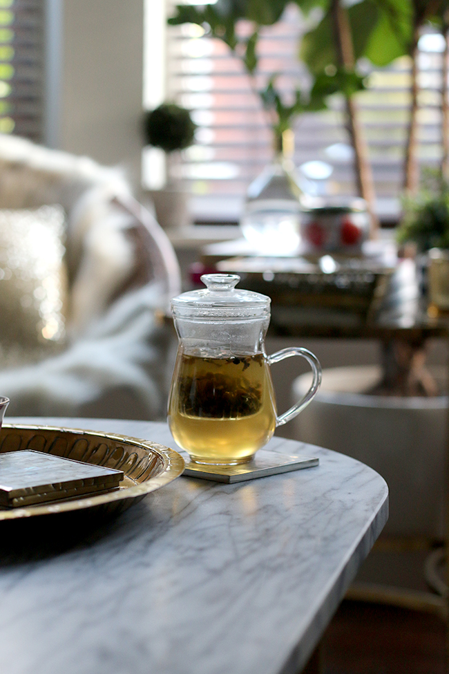 Swoon Worthy - Goals for 2016 - glass mug of tea on white marble coffee table