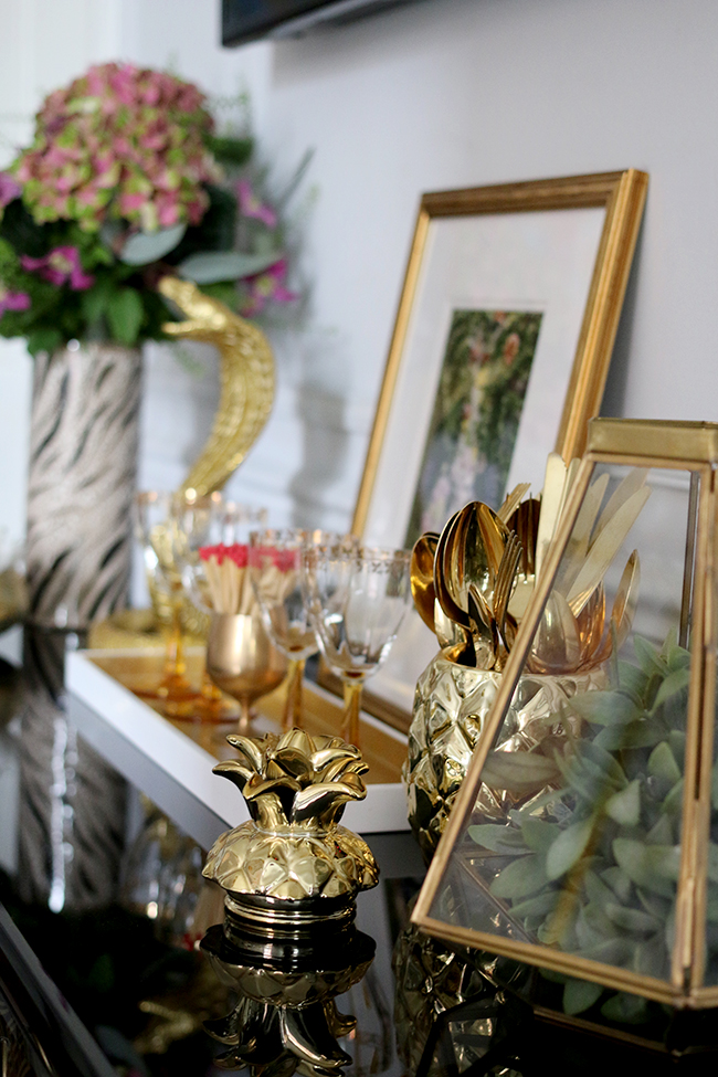 console table vignette with lots of gold - see more on www.swoonworthy.co.uk