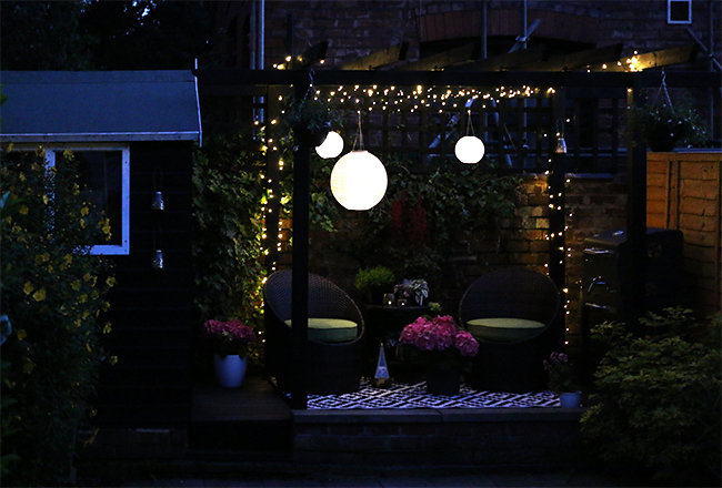 patio with fairy lights and solar chinese lanterns