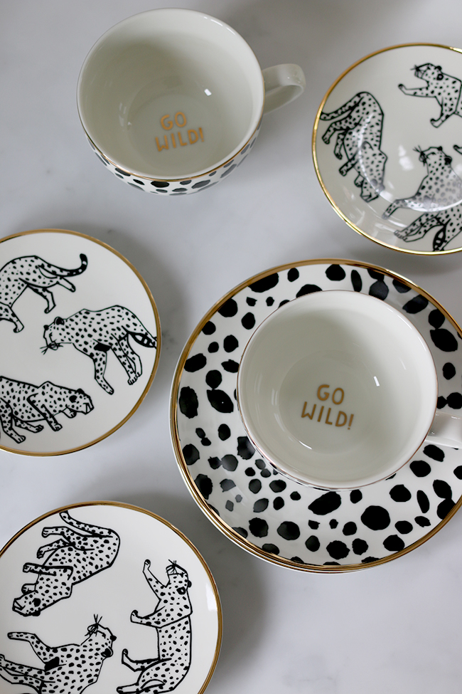 black and white leopard print mugs and plates with gold trim from H&M Home