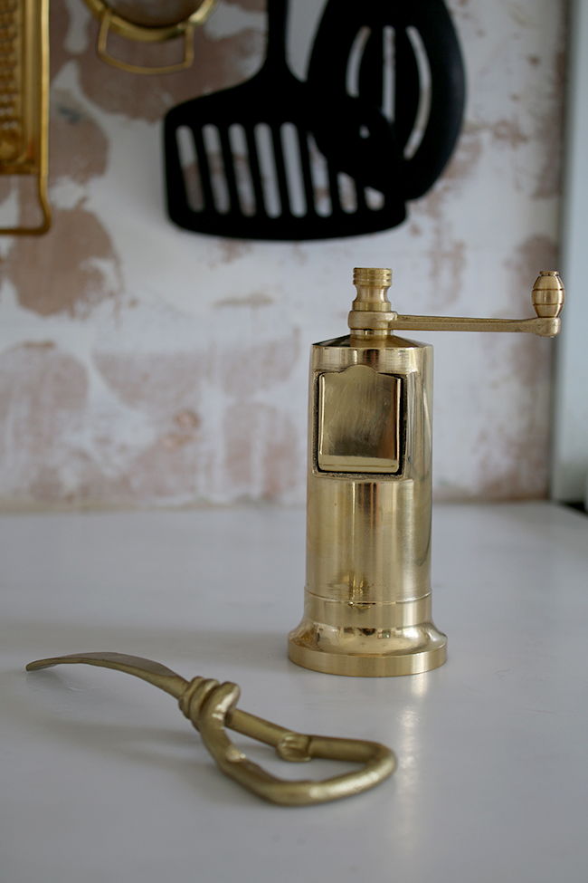 brass pepper grinder and hand forged bottle opener