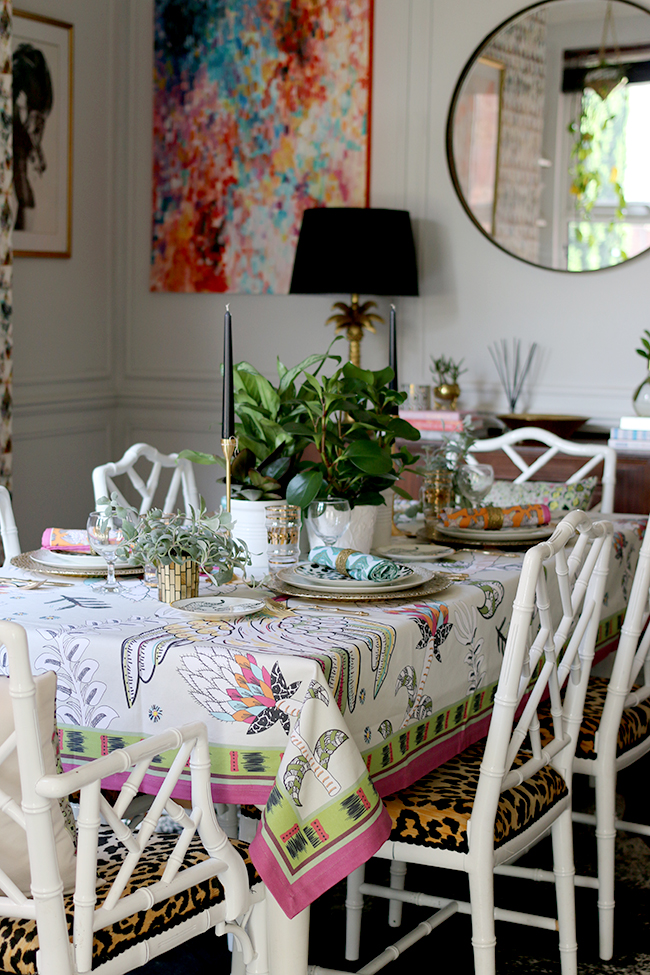 Colourful table setting with plants and animal prints