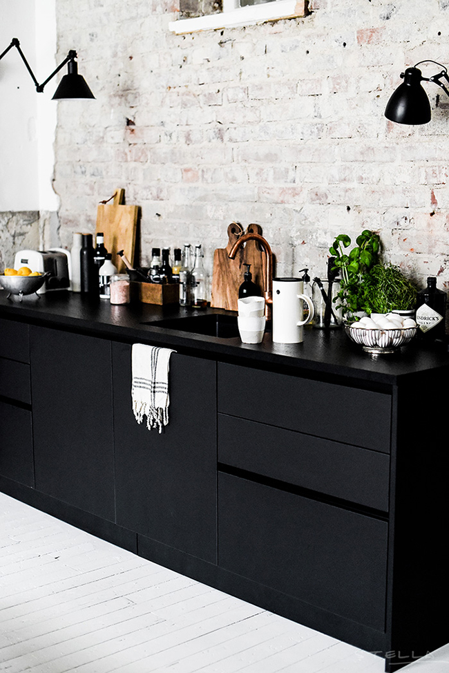 copper-tap-with-black-cupboards