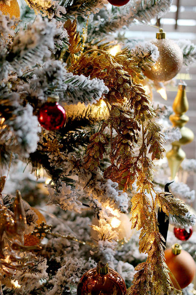 glam flocked Christmas tree in gold and red - see more on www.swoonworthy.co.uk