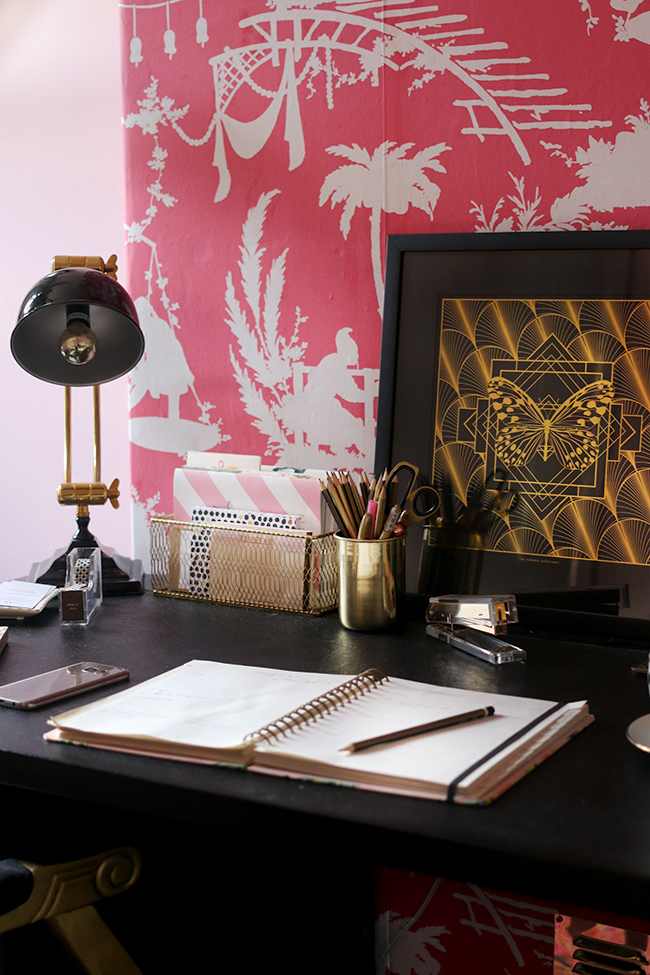 Eclectic boho glam office with blush pink walls and black and gold accents