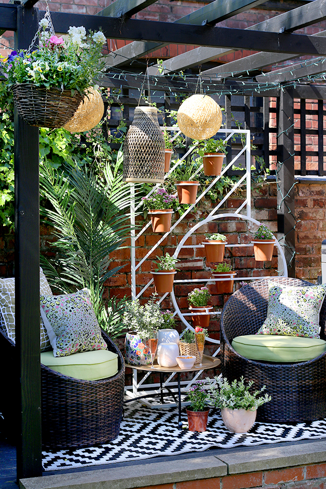 small garden design in Edwardian semi with two separate seating areas including a pergola
