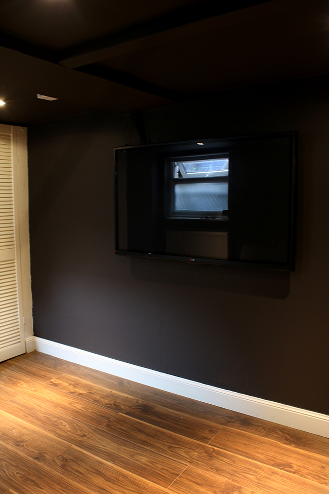 dark cellar remodel in Farrow and Ball's Tanner Brown