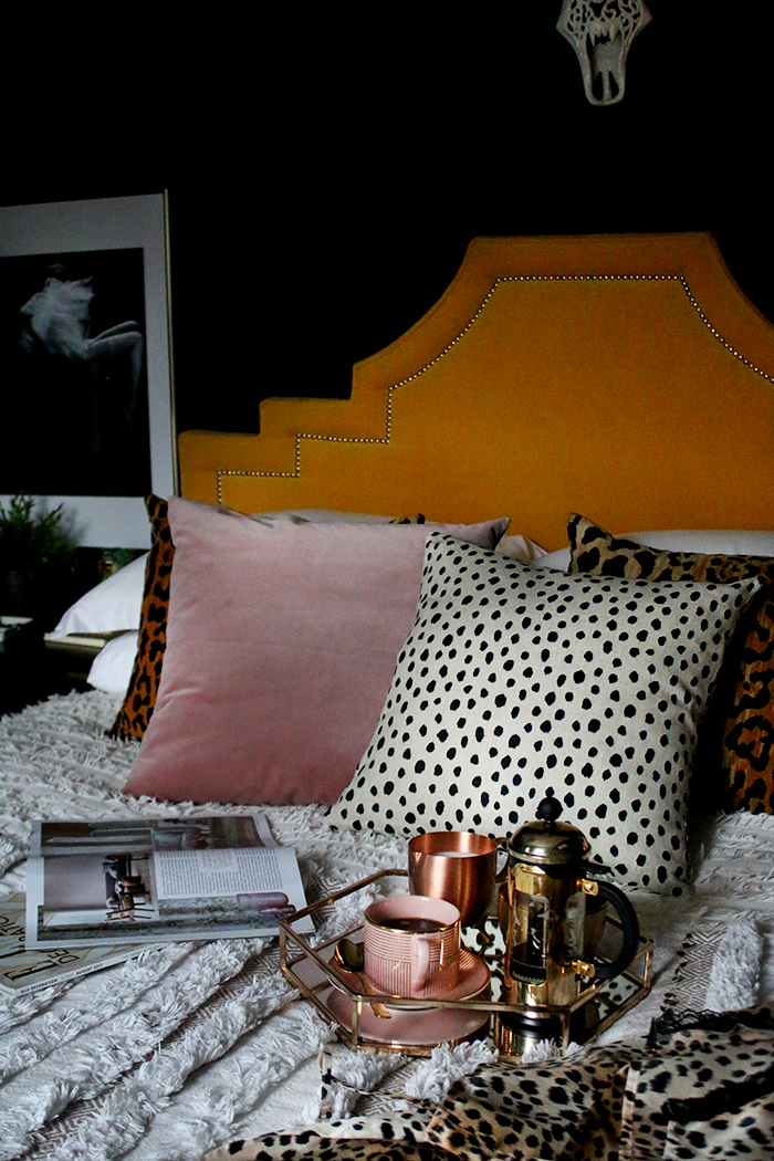 boho glam bedroom in black yellow and blush pink