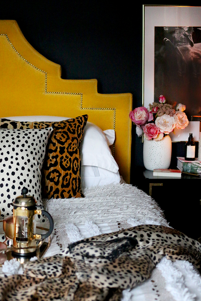 boho glam bedroom in black yellow and blush pink