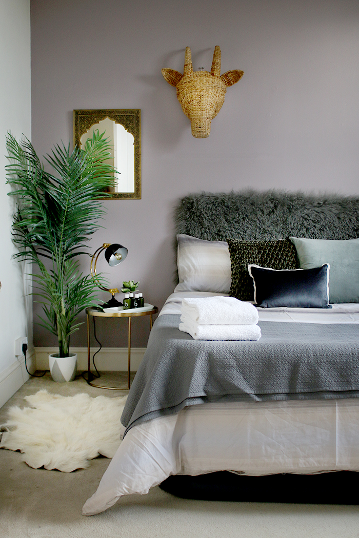 Grey and lilac guest bedroom with boho touches
