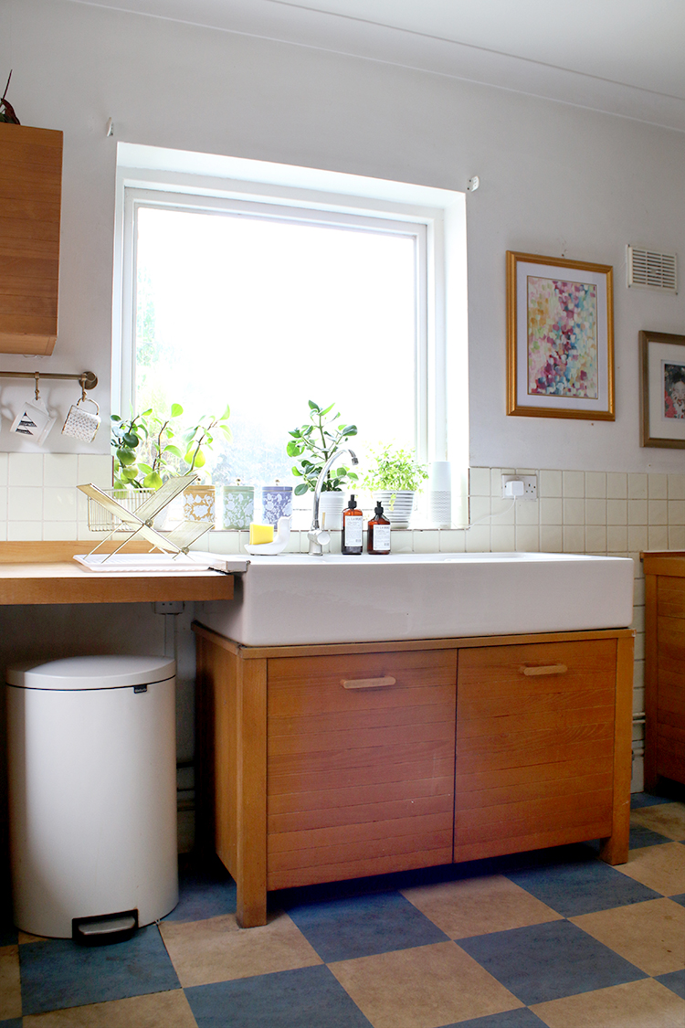 ceramic belfast sink in wood kitchen before