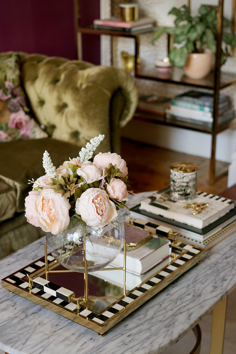 coffee table styling with flowers and marble