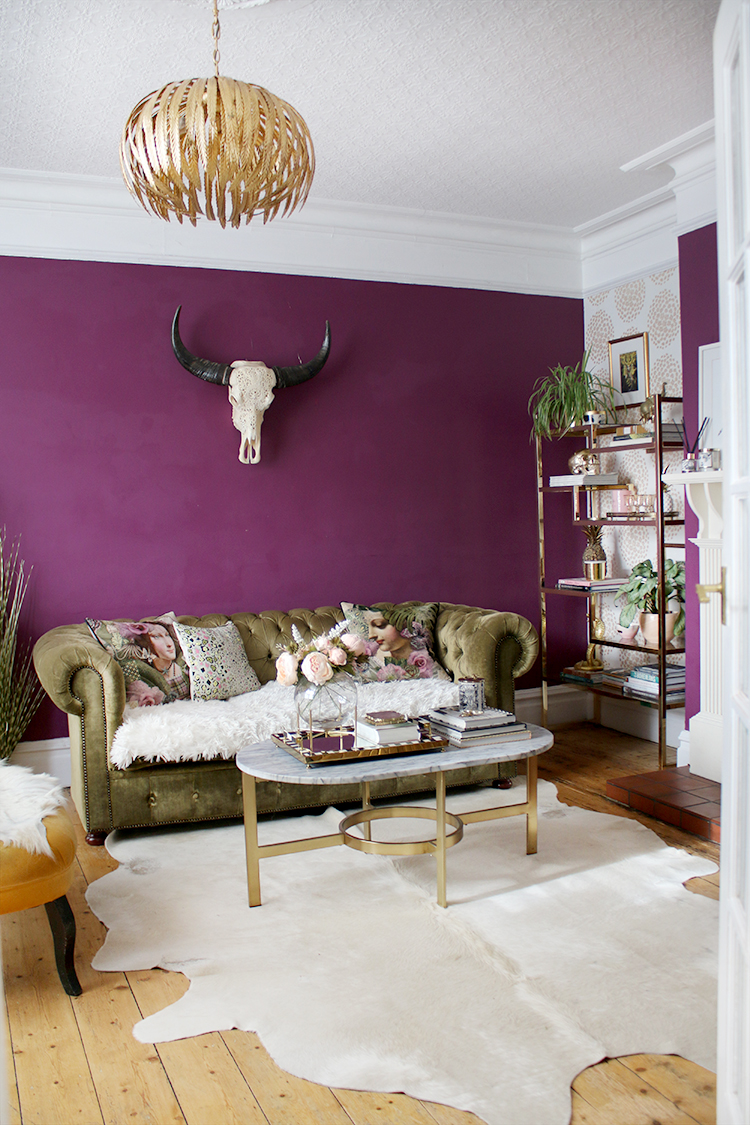 boho glam plum living room with green velvet chesterfield