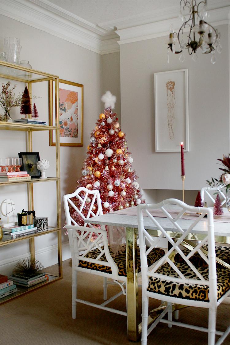 pink christmas tree in dining room