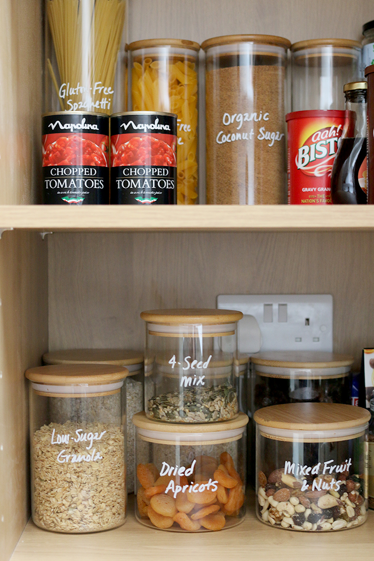 inside pantry with bamboo glass jars