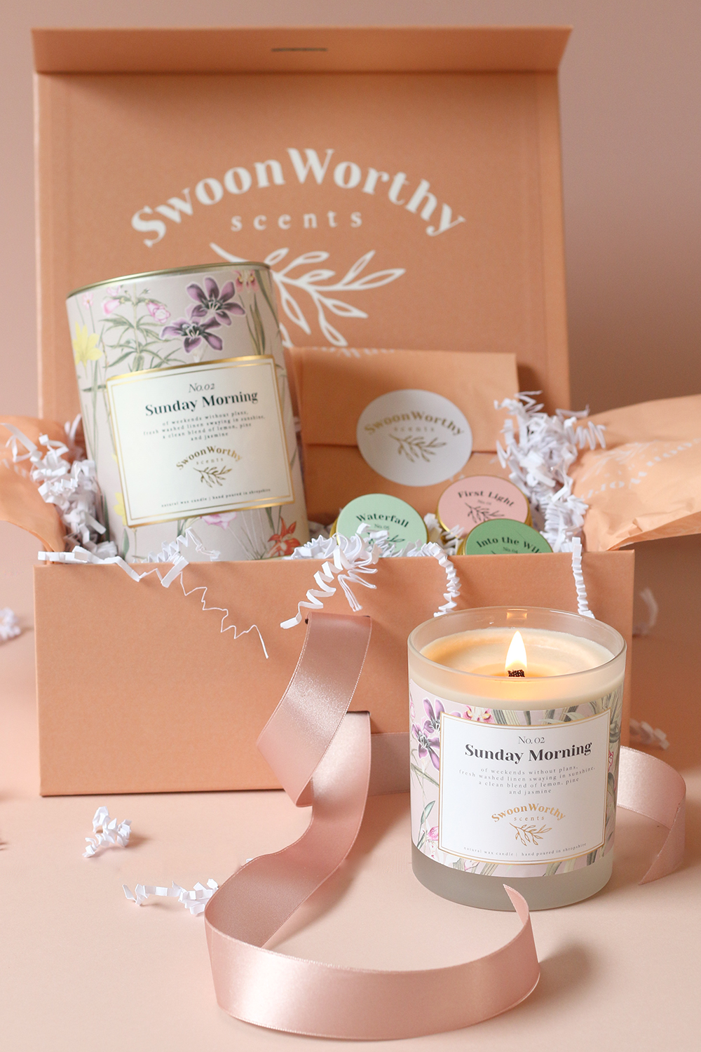 Gift box with candle and tealights in luxury peach box